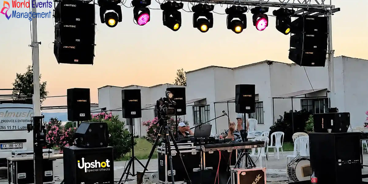 Outdoor event AV setup with professional speakers, stage lighting, and technical production equipment in Dubai
