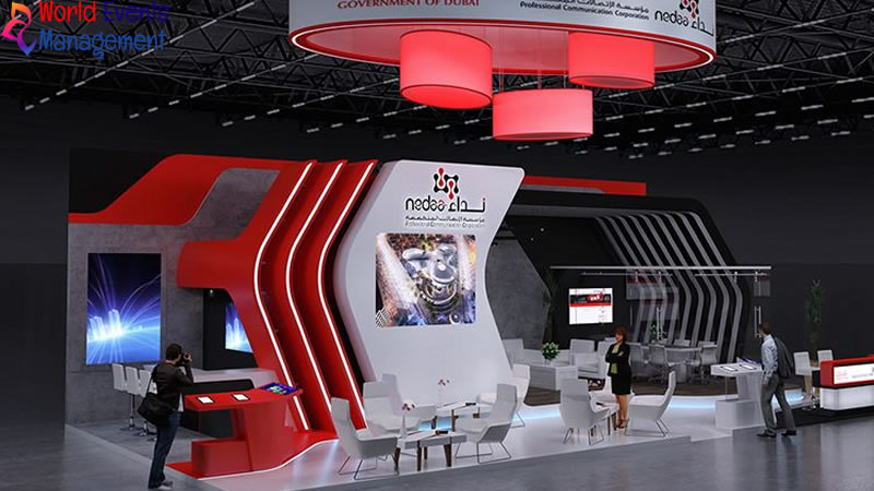 Futuristic red exhibition stand with curved architecture, LED screens, and innovative technology elements