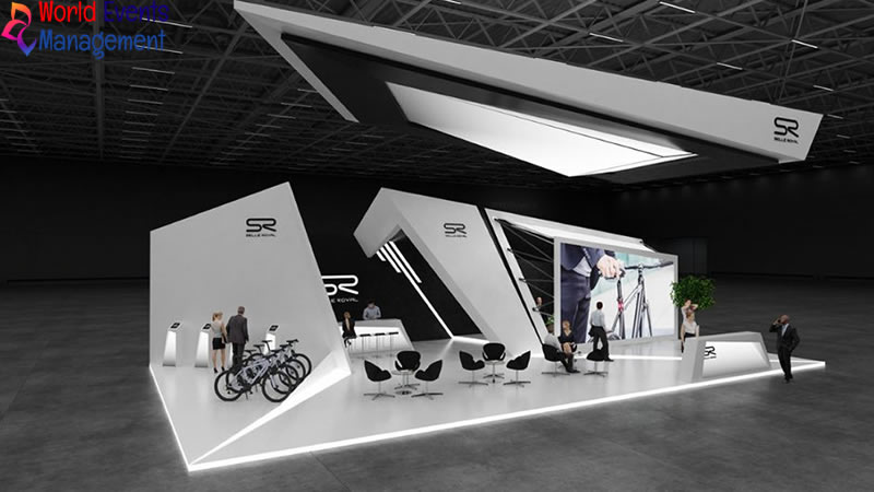 Modern minimalist exhibition stand design with white architectural structure and creative display area